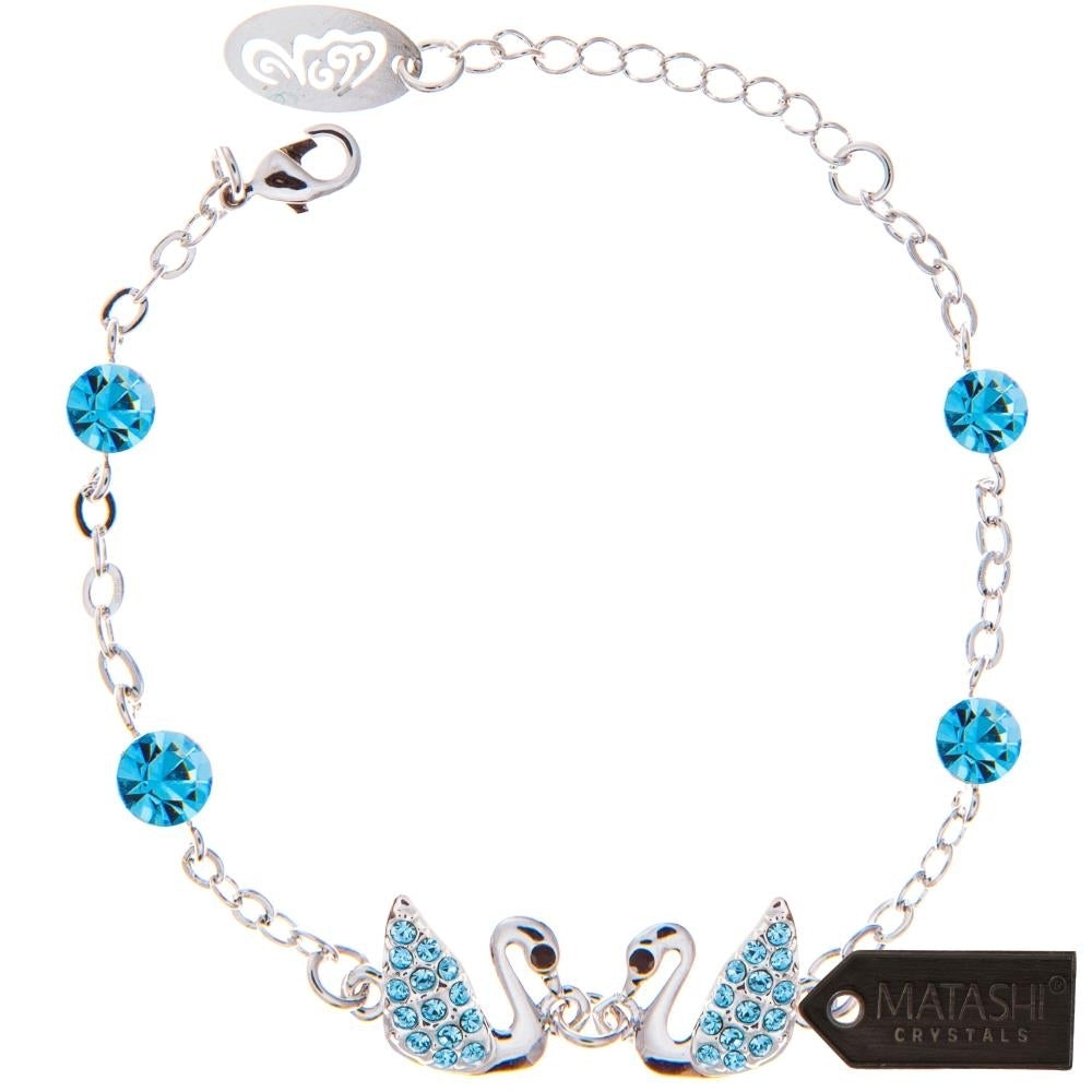 Matashi Rhodium Plated Bracelet with Loving Swans Design with Lobster Clasp and fine Ocean Blue Crystals Image 3