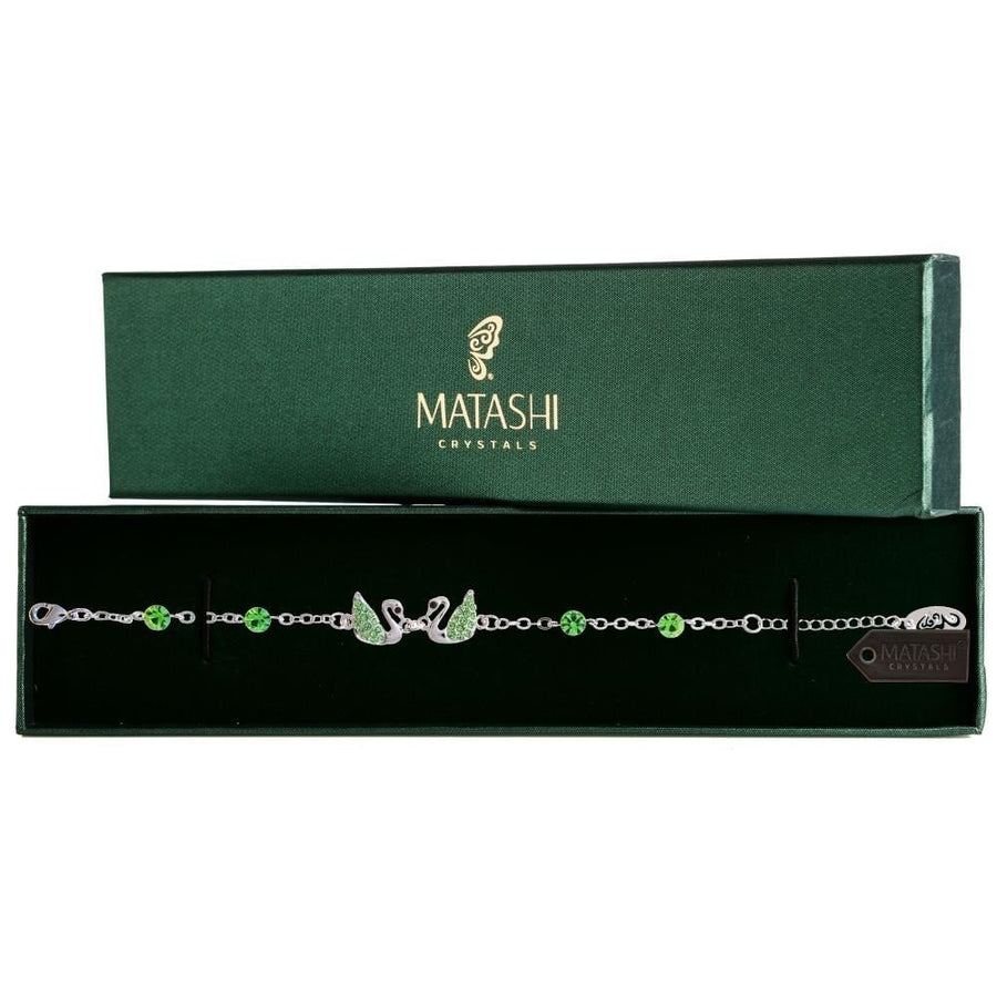 Matashi Rhodium Plated Bracelet w/ Loving Swans Design with Lobster Clasp and fine Olive Green Crystals Image 1