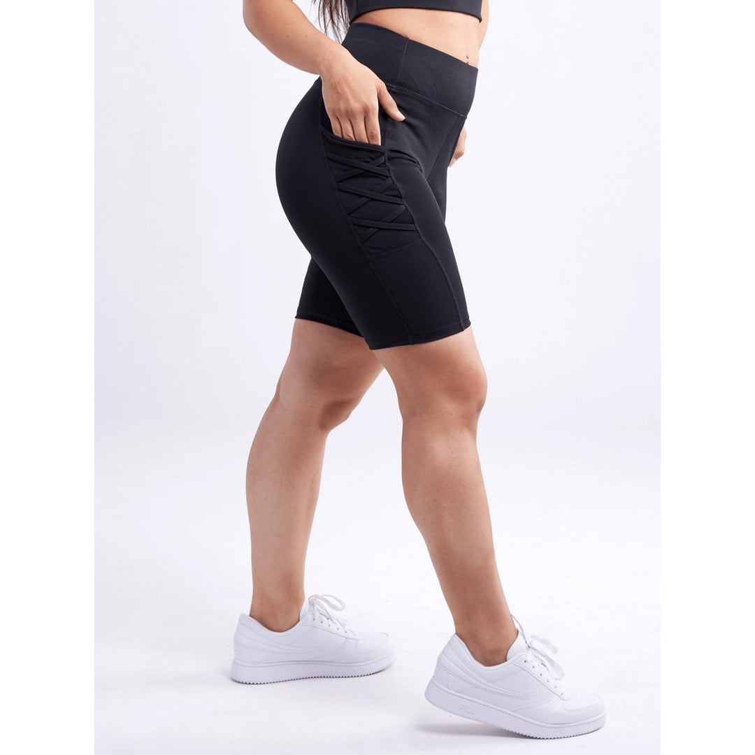 High-Waisted Workout Shorts with Pockets and Criss Cross Design Image 1