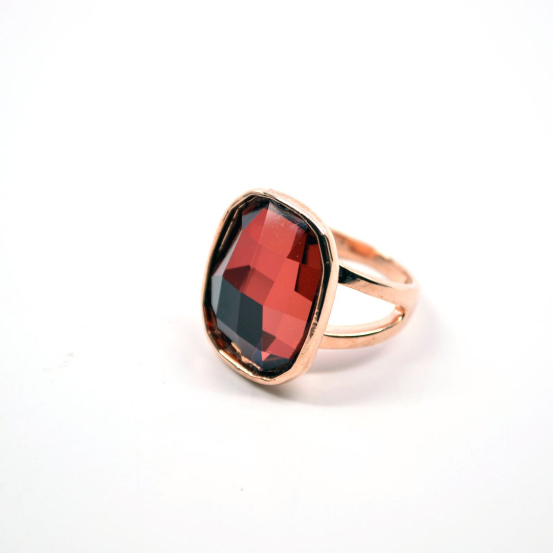 Deep Siam Red Blood Orange Colored Gemstone Set in a Rose Gold Plated Ring Image 2