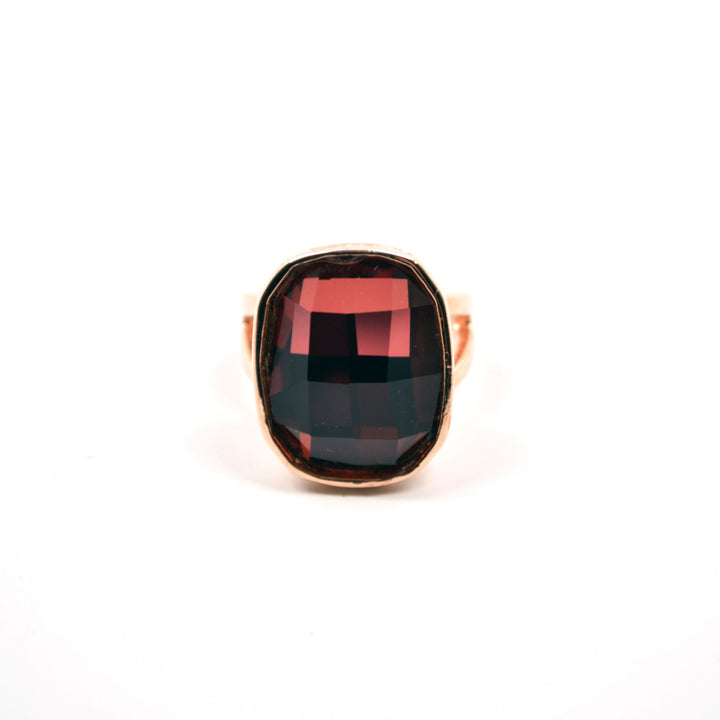 Deep Siam Red Blood Orange Colored Gemstone Set in a Rose Gold Plated Ring Image 3