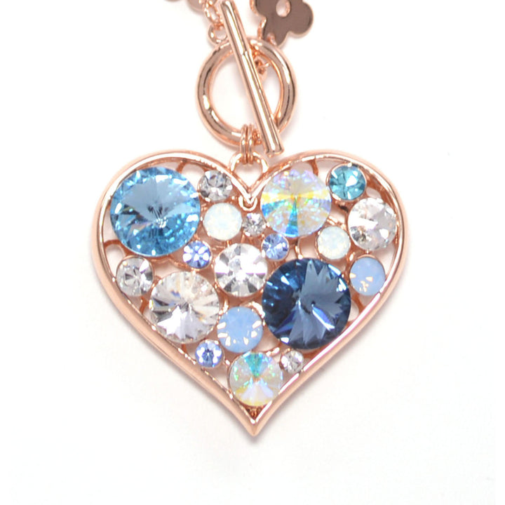 Heart Shaped Charm Necklace With Blue Colored Zircon Crystals And Rose Gold Plated Chain Image 2