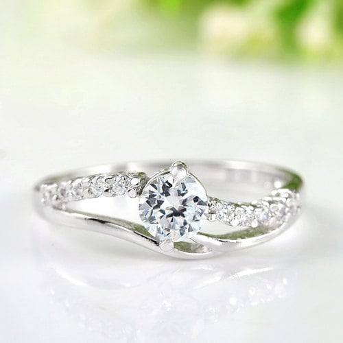 18k White Gold Plated Engagement / Promise Ring With Round Cut Zircon Crystals Image 1