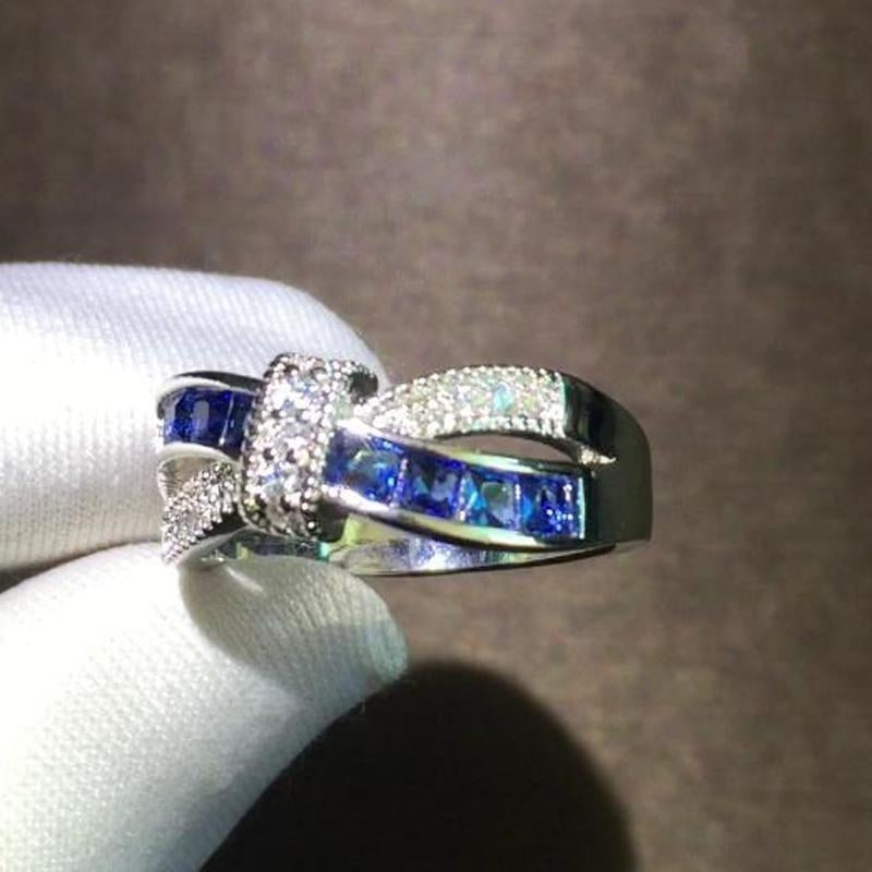 White Gold Plated Cross Blue Engagement Ring Image 2