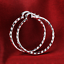 Womens 925 Sterling Silver Diamond-Cut Round Vogue Hoop Earrings Image 1