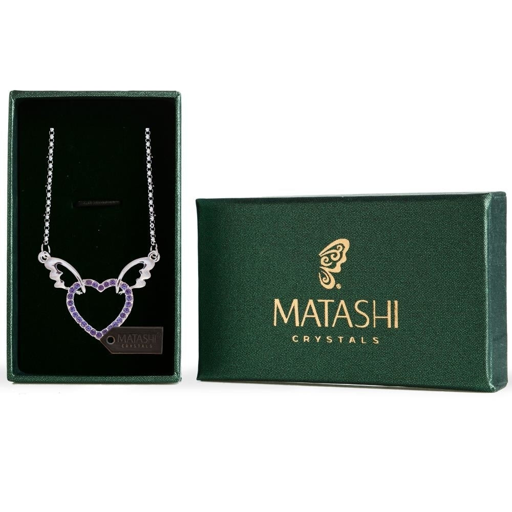 Rhodium Plated Necklace with Winged Heart Design with a 16" Extendable Chain and fine Purple Crystals by Matashi Image 1