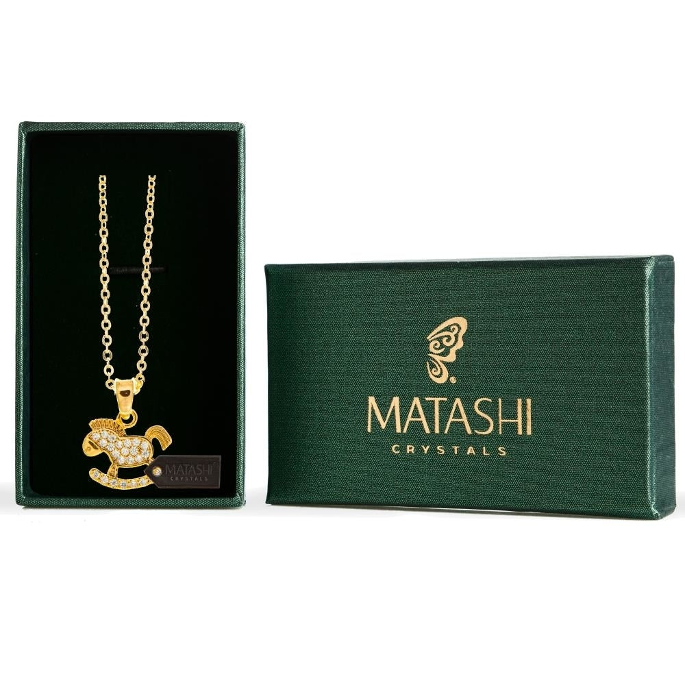 Champagne Gold Plated Necklace with Rocking Horse Design with a 16" Extendable Chain and fine Clear Crystals by Matashi Image 1