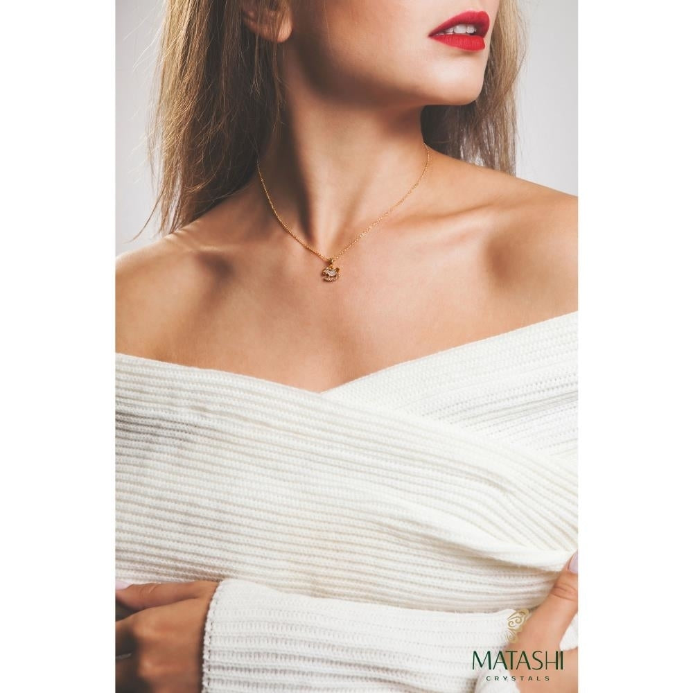 Champagne Gold Plated Necklace with Rocking Horse Design with a 16" Extendable Chain and fine Clear Crystals by Matashi Image 4