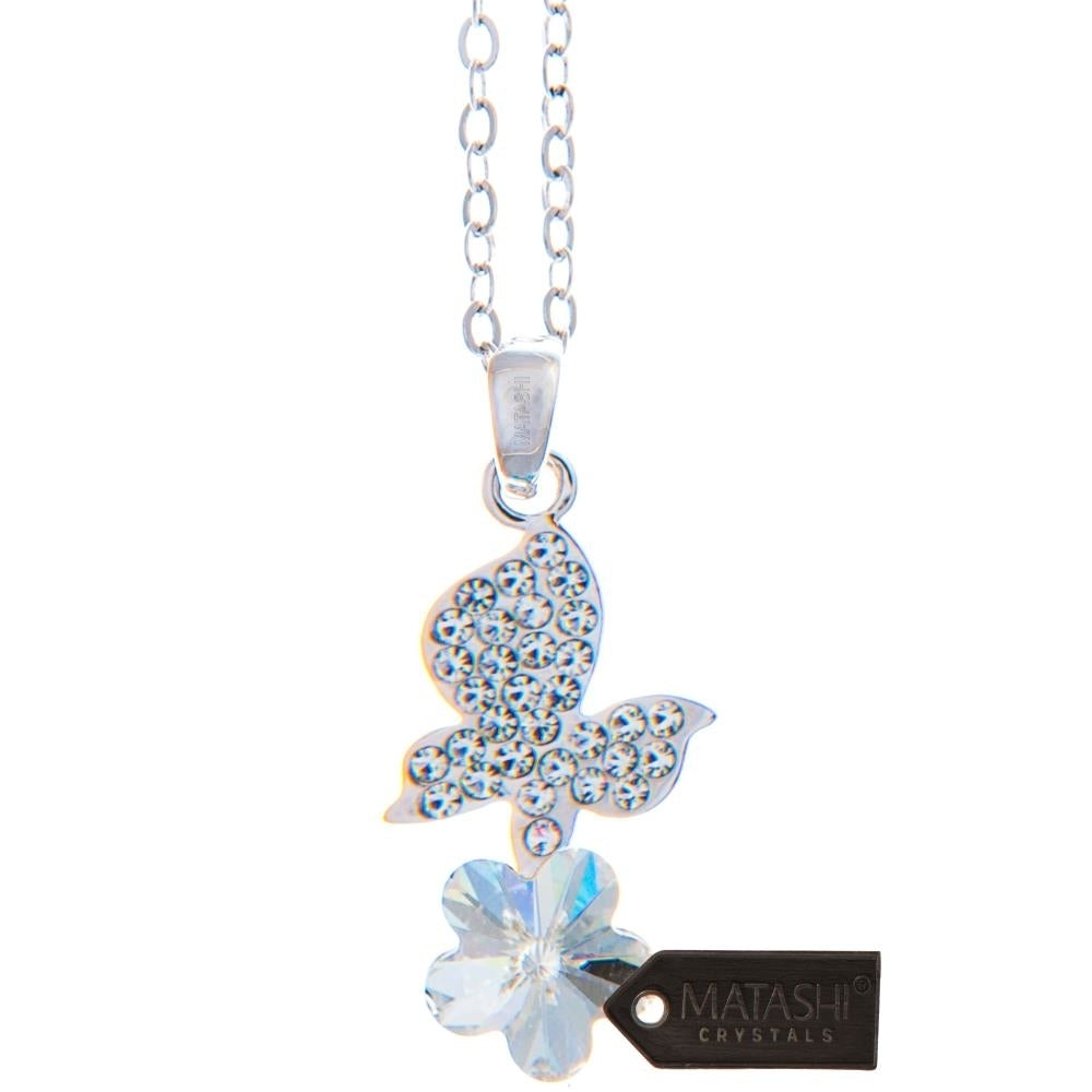 Rhodium Plated Necklace with Butterfly Alighting on a Flower Design with a 16" Extendable Chain and fine Clear Crystals Image 2