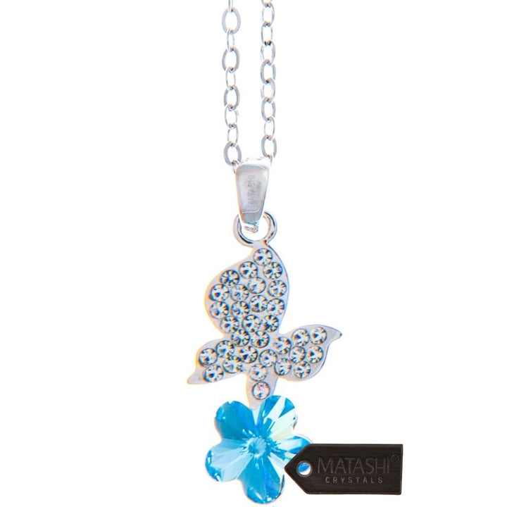 Rhodium Plated Necklace with Butterfly Alighting on a Flower Design with a 16" Extendable Chain and fine Blue Crystals Image 2