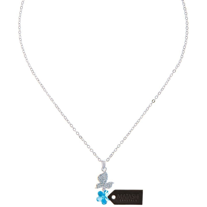 Rhodium Plated Necklace with Butterfly Alighting on a Flower Design with a 16" Extendable Chain and fine Blue Crystals Image 3