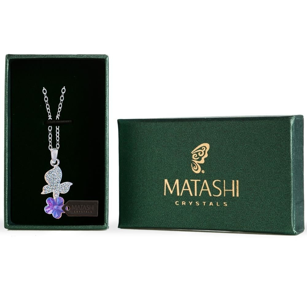 Rhodium Plated Necklace with Butterfly Alighting on a Flower Design with a 16" Extendable Chain and fine Purple Crystals Image 1