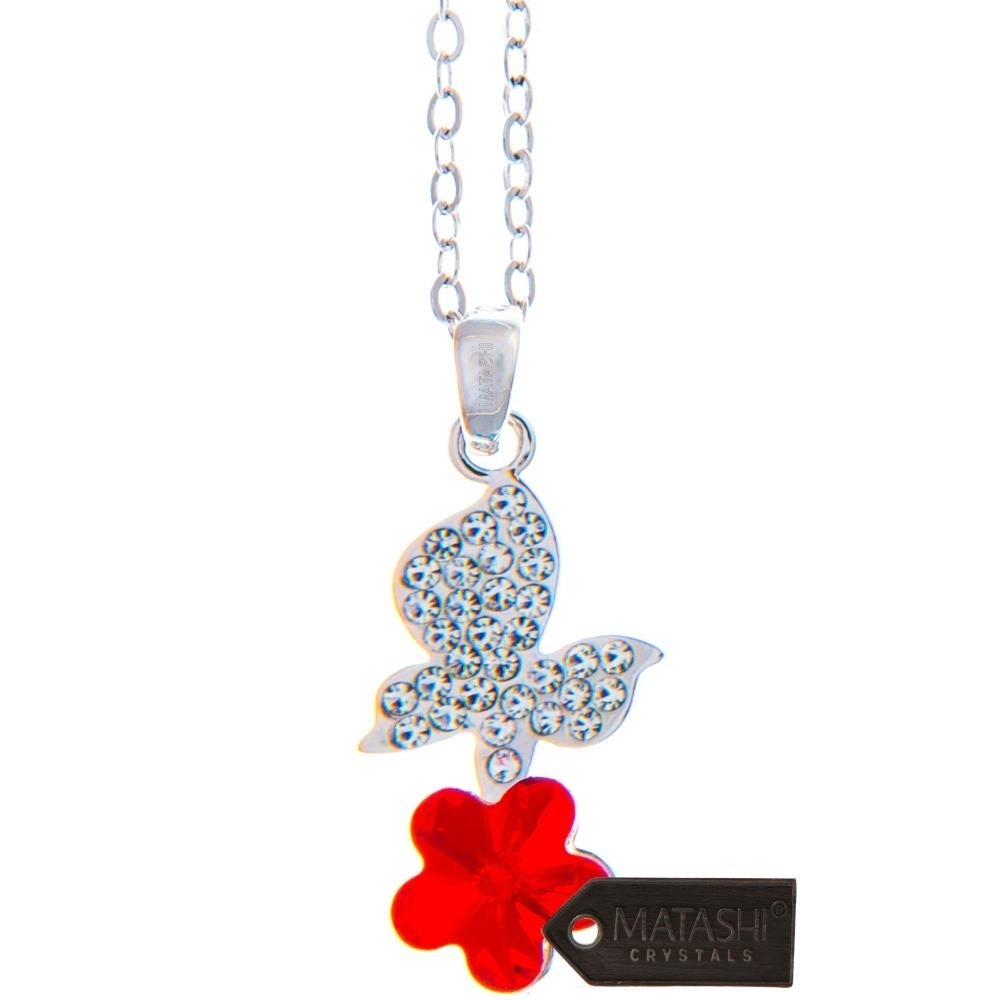 Rhodium Plated Necklace with Butterfly Alighting on a Flower Design with a 16" Extendable Chain and fine Red Crystals by Image 2