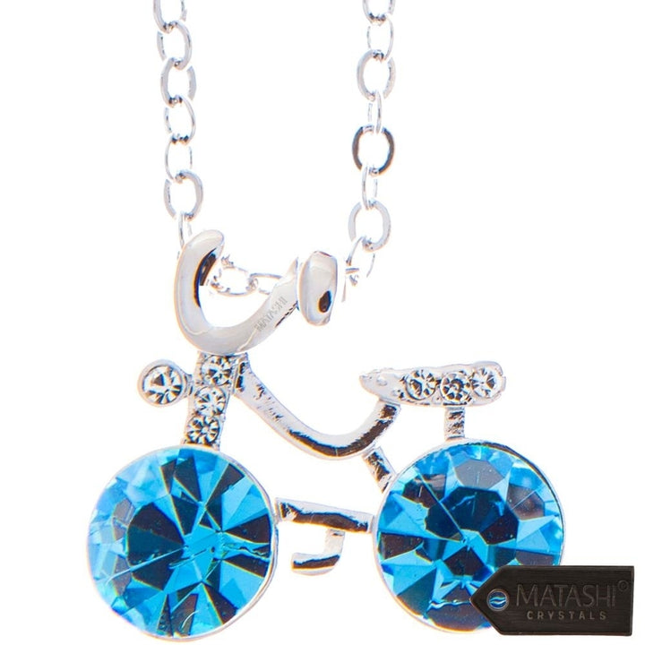 Rhodium Plated Necklace with Bicycle Design with a 16" Extendable Chain and fine Ocean Blue Crystals by Matashi Image 2