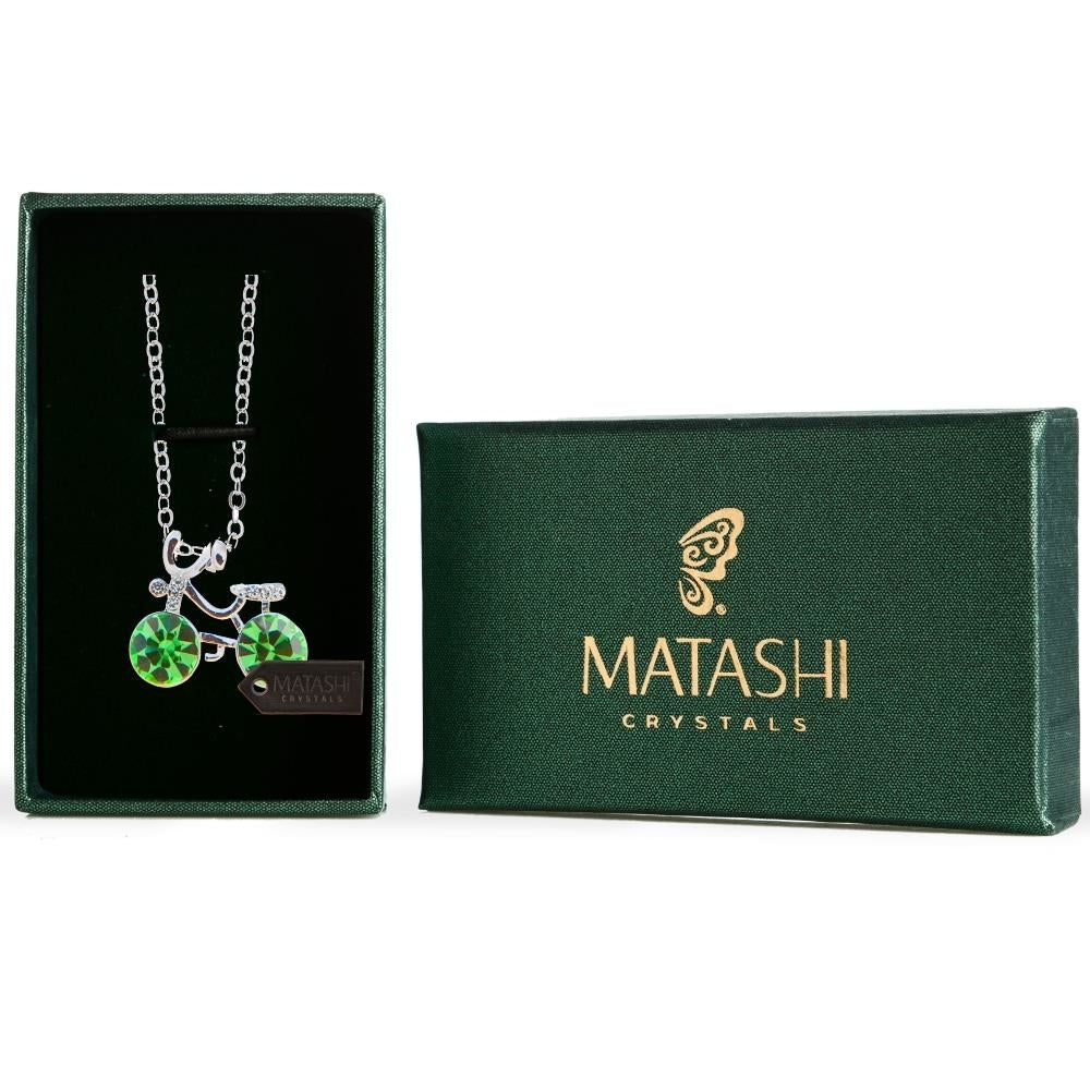 Rhodium Plated Necklace with Bicycle Design with a 16" Extendable Chain and fine Olive Green Crystals by Matashi Image 1