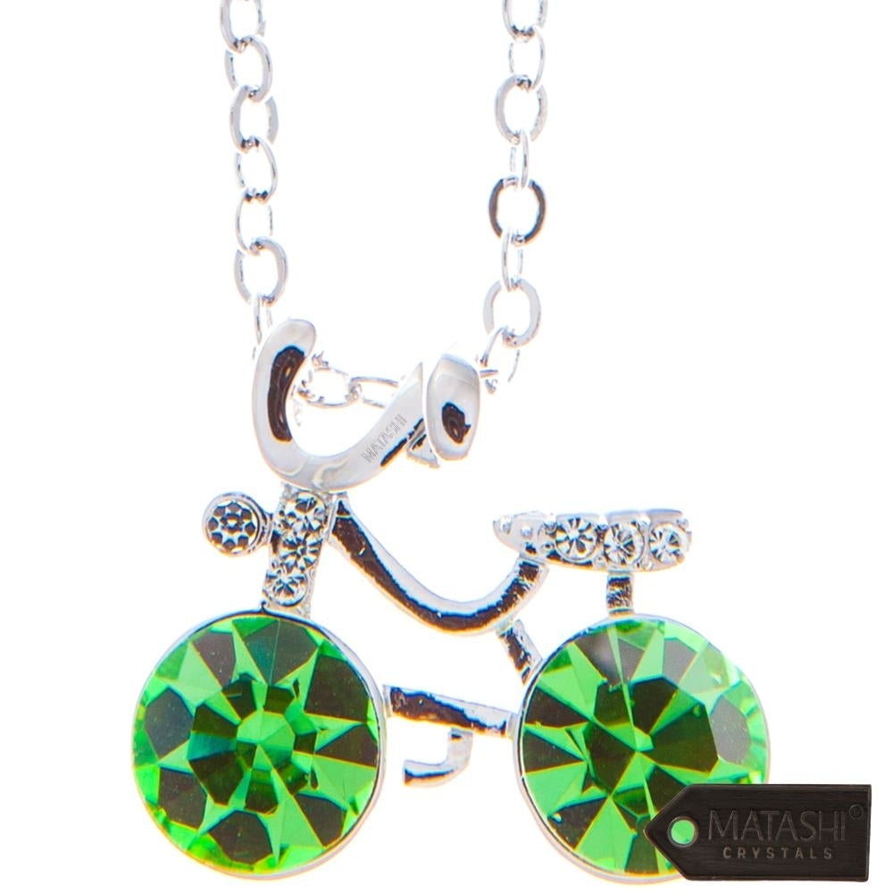 Rhodium Plated Necklace with Bicycle Design with a 16" Extendable Chain and fine Olive Green Crystals by Matashi Image 2