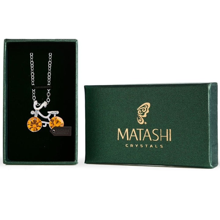 Rhodium Plated Necklace with Bicycle Design with a 16" Extendable Chain and fine Yellow Crystals by Matashi Image 1