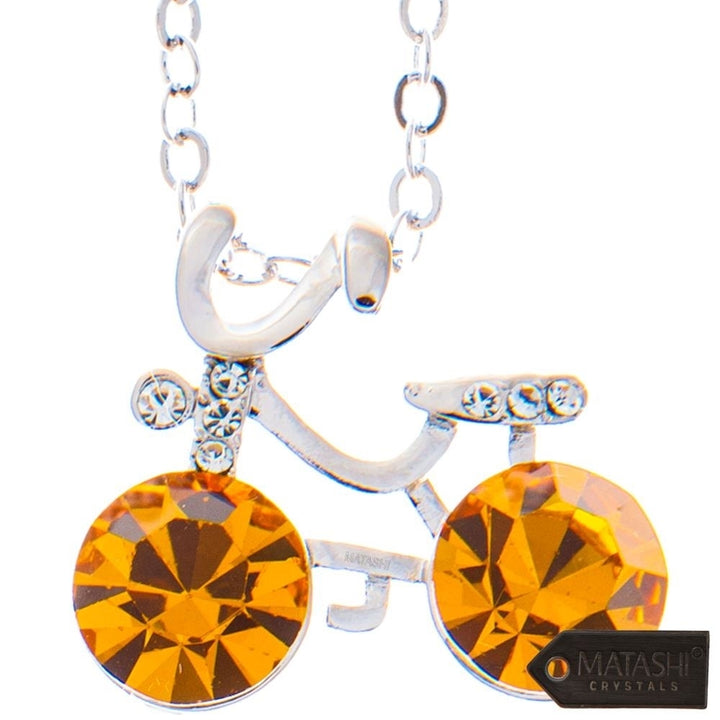 Rhodium Plated Necklace with Bicycle Design with a 16" Extendable Chain and fine Yellow Crystals by Matashi Image 2