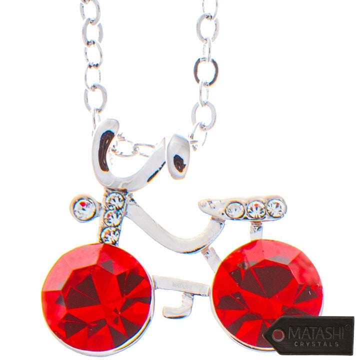 Rhodium Plated Necklace with Bicycle Design with a 16" Extendable Chain and fine Red Crystals by Matashi Image 2