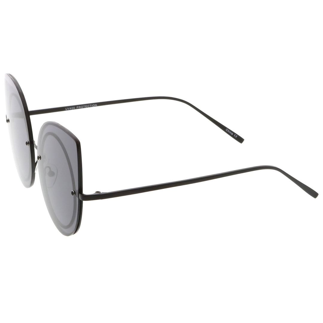 Oversize Rimless Cat Eye Sunglasses With Neutral Color Flat Lens Slim Arms 64mm Image 3