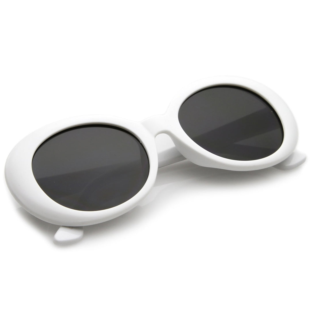 Retro Oval Sunglasses Tapered Arms Neutral Colored Round Lens 53mm Image 6