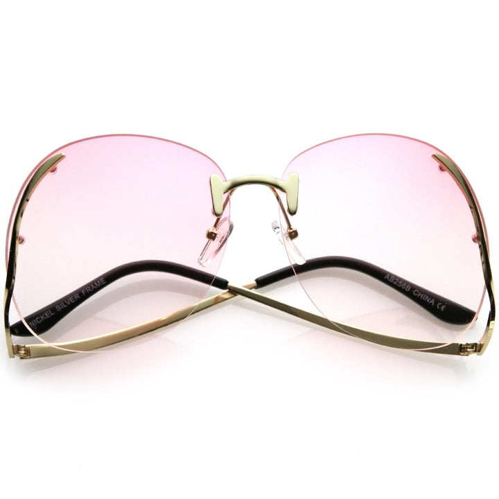 Womens Rimless Oversize Sunglasses Curved Metal Arms Round Color Tinted Lens 67mm Image 4