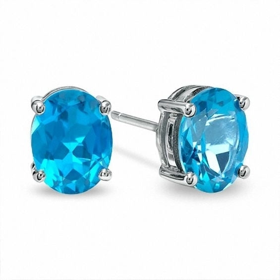 14K White Gold Plated 1 Ct Blue Topaz Round Oval Stud Earrings Image 1