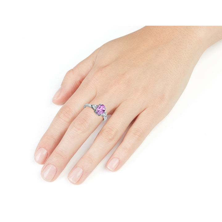 Three Stone Created Pink Sapphire and White Topaz Ring in Sterling Silver Image 2