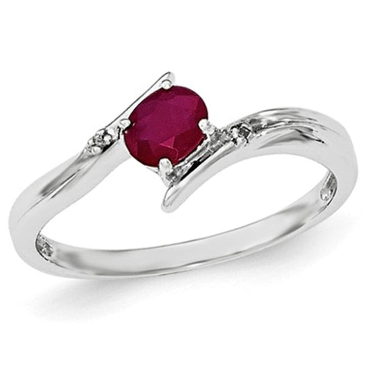 1/3 Carat (ctw) Oval-Cut Ruby Ring in Sterling Silver Image 1