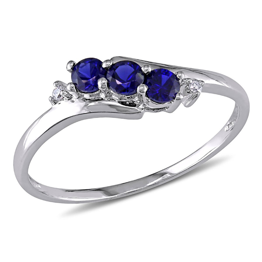 2/5 Carat (ctw) Lab-Created Blue Sapphire Three Stone Ring in 10K White Gold with Accent Diamonds Image 1