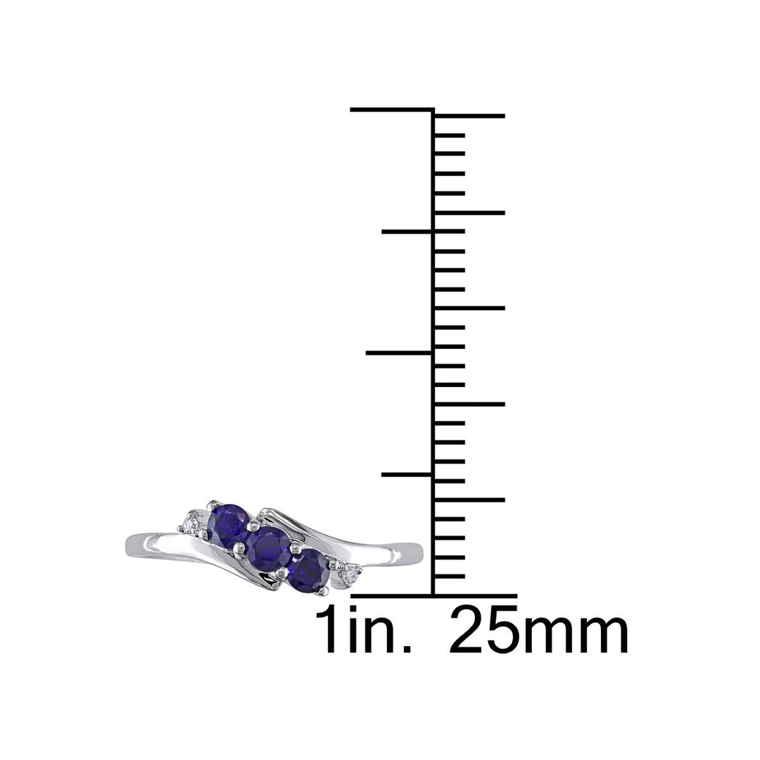 2/5 Carat (ctw) Lab-Created Blue Sapphire Three Stone Ring in 10K White Gold with Accent Diamonds Image 3