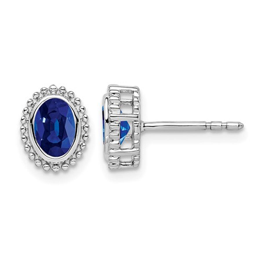 1/2 Carat (ctw) Oval Blue Sapphire Solitaire Earrings in 14K White Gold Image 1