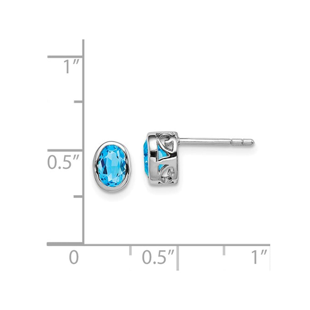 1/2 Carat (ctw) Oval Cut Sky Blue Topaz Stud Earrings in Sterling Silver Image 2