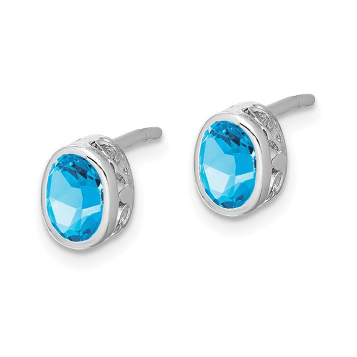 1/2 Carat (ctw) Oval Cut Sky Blue Topaz Stud Earrings in Sterling Silver Image 3