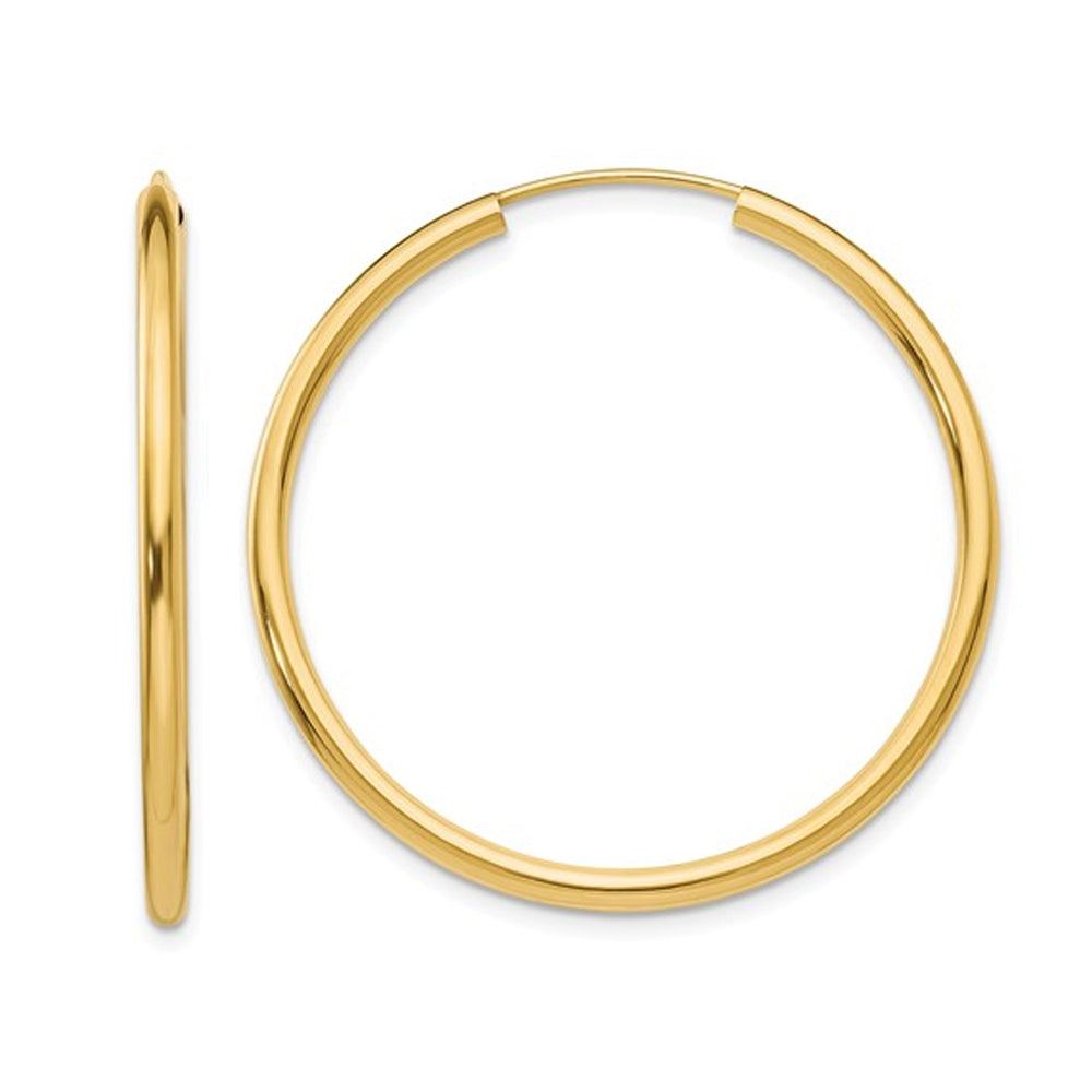 14K Yellow Gold Medium Hoop Earrings 1 1/4 Inch (2.00 mm) Image 1