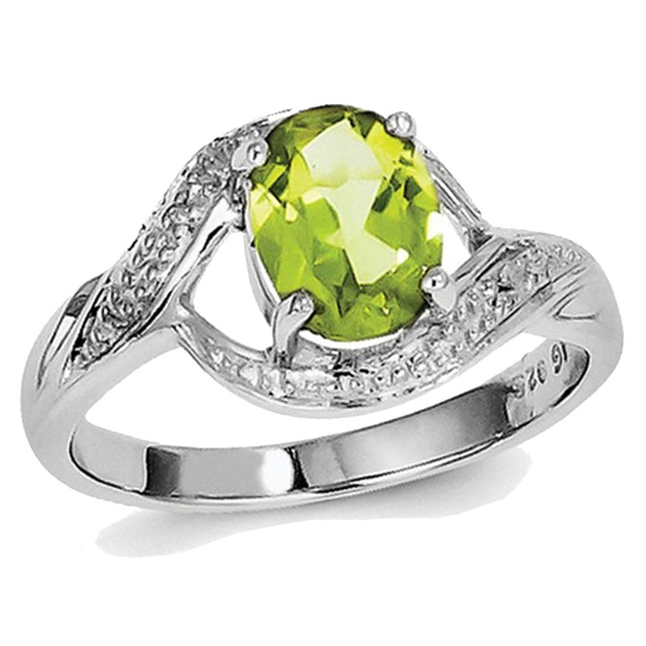 1.25 Carat (ctw) Oval Peridot Ring in Sterling Silver Image 2