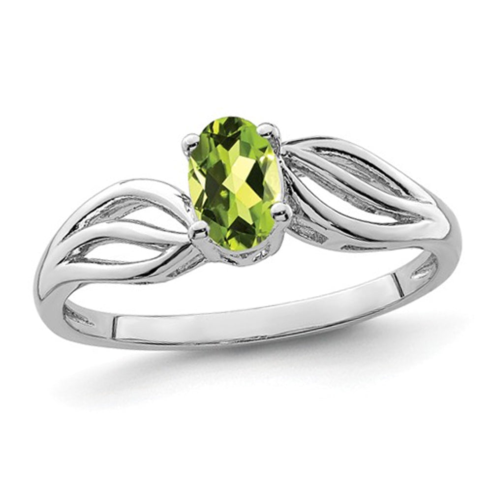 1/2 Carat (ctw) Peridot Ring in Sterling Silver Image 1