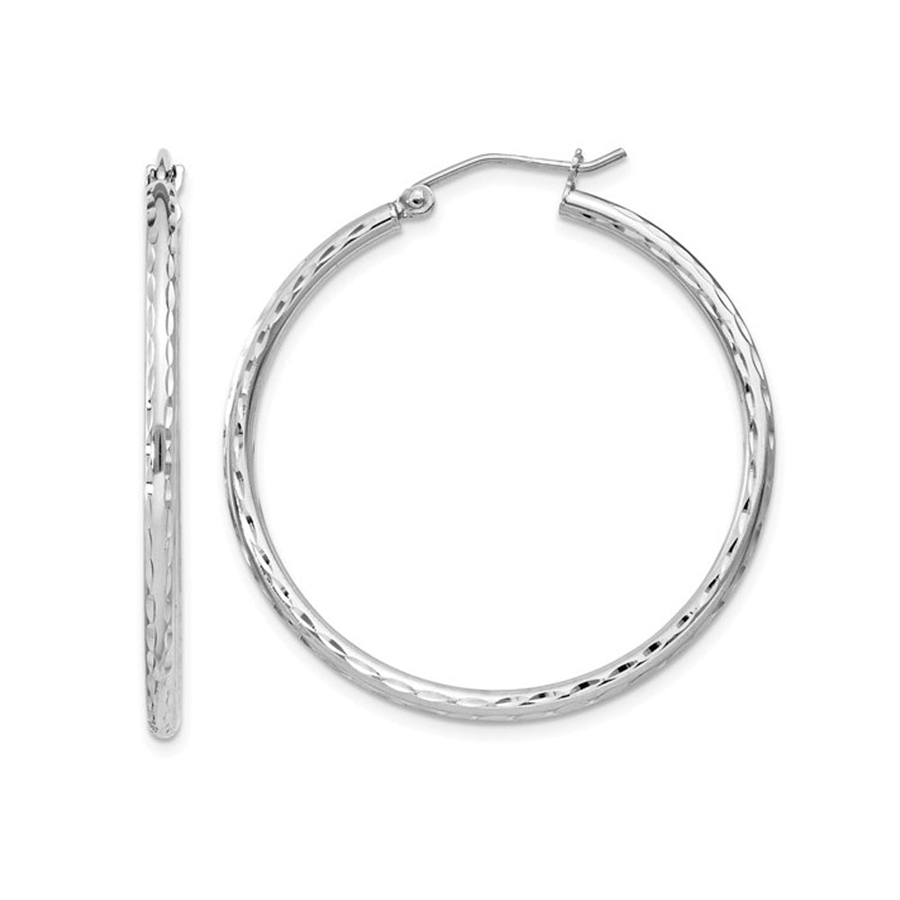 Medium Diamond Cut Hoop Earrings in Sterling Silver 1 1/4 Inch (2.0mm) Image 1