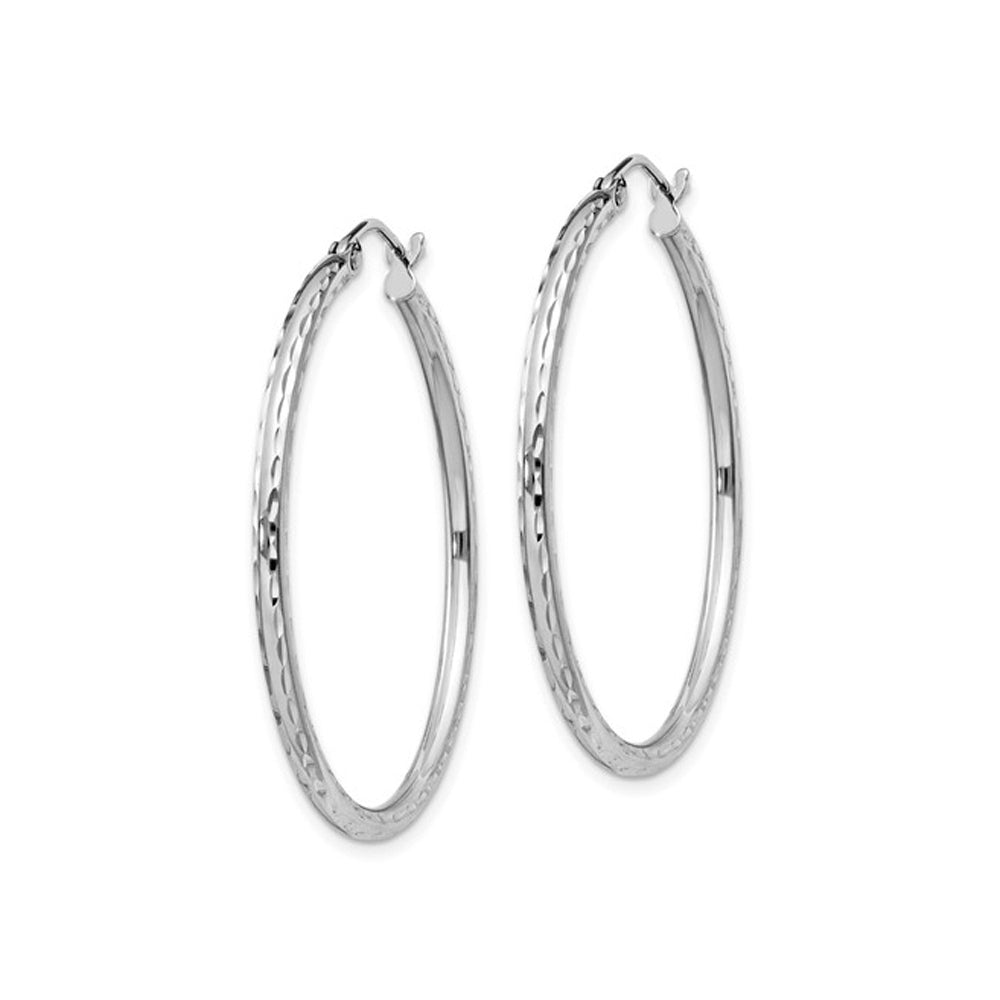 Medium Diamond Cut Hoop Earrings in Sterling Silver 1 1/4 Inch (2.0mm) Image 2