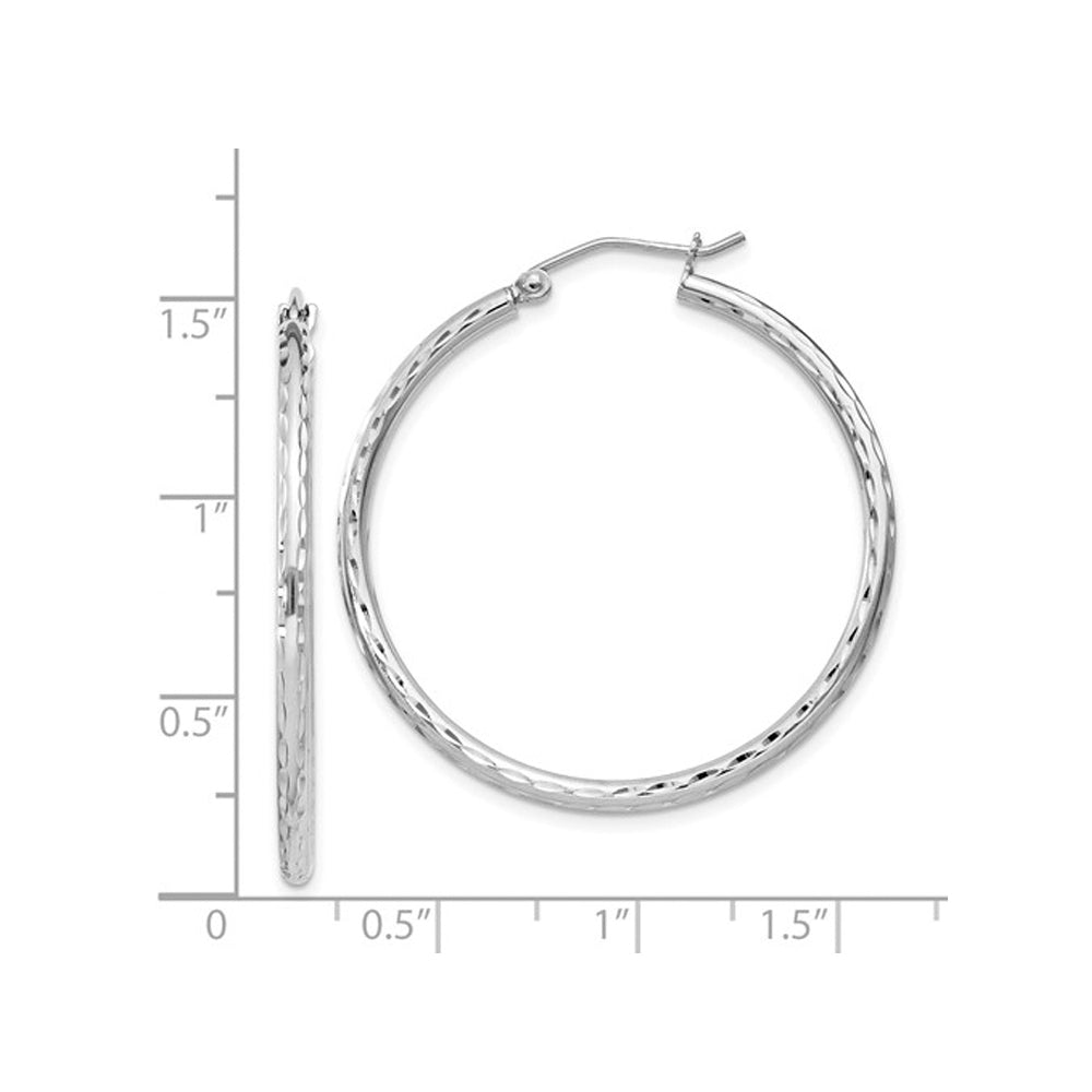 Medium Diamond Cut Hoop Earrings in Sterling Silver 1 1/4 Inch (2.0mm) Image 3