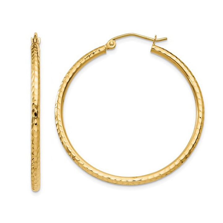 Medium Diamond Cut Hoop Earrings in 14K Yellow Gold 1 1/4 Inch (2.00 mm) Image 1