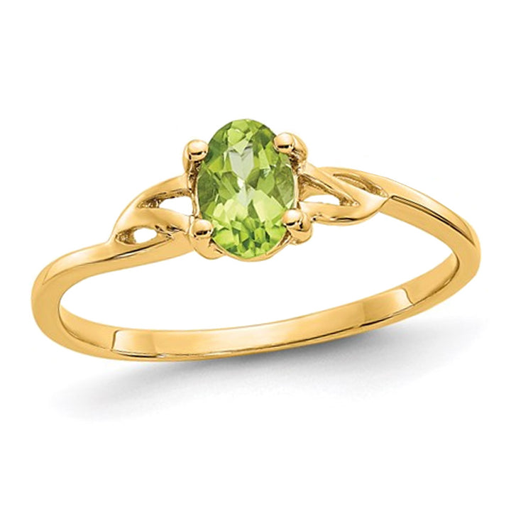 2/5 Carat (ctw) Oval-Cut Peridot Ring in 14K Yellow Gold Image 1