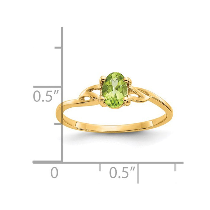 2/5 Carat (ctw) Oval-Cut Peridot Ring in 14K Yellow Gold Image 2