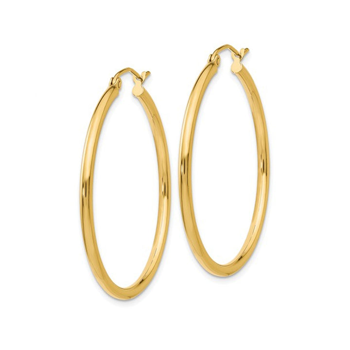 14K Yellow Gold Lightweight Tube Hoop Earrings 1 1/4 Inch (2.00 mm) Image 4