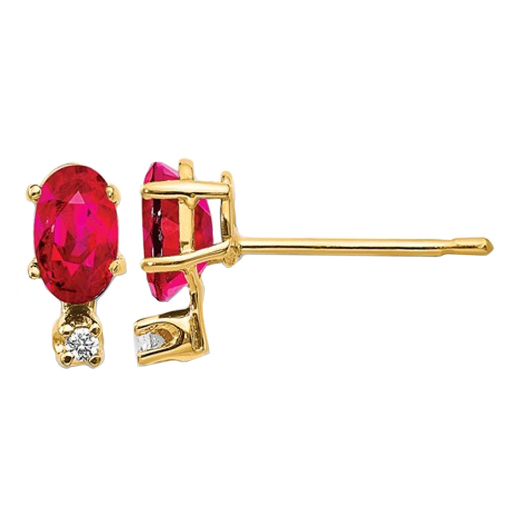 2/3 Carat (ctw) Ruby Post Earrings in 14K Yellow Gold with Accent Diamonds Image 1