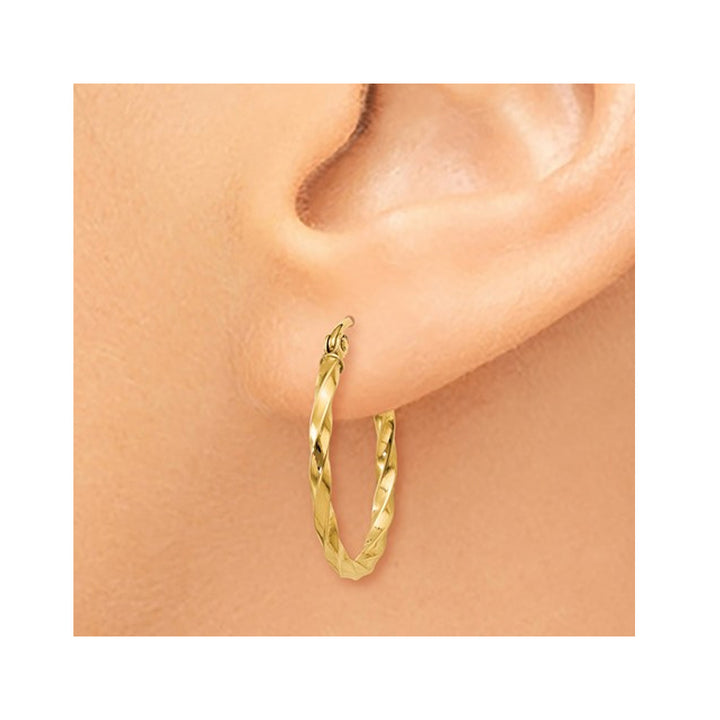 Medium Twist Hoop Earrings in 14K Yellow Gold 3/4 Inch (2.00 mm) Image 4