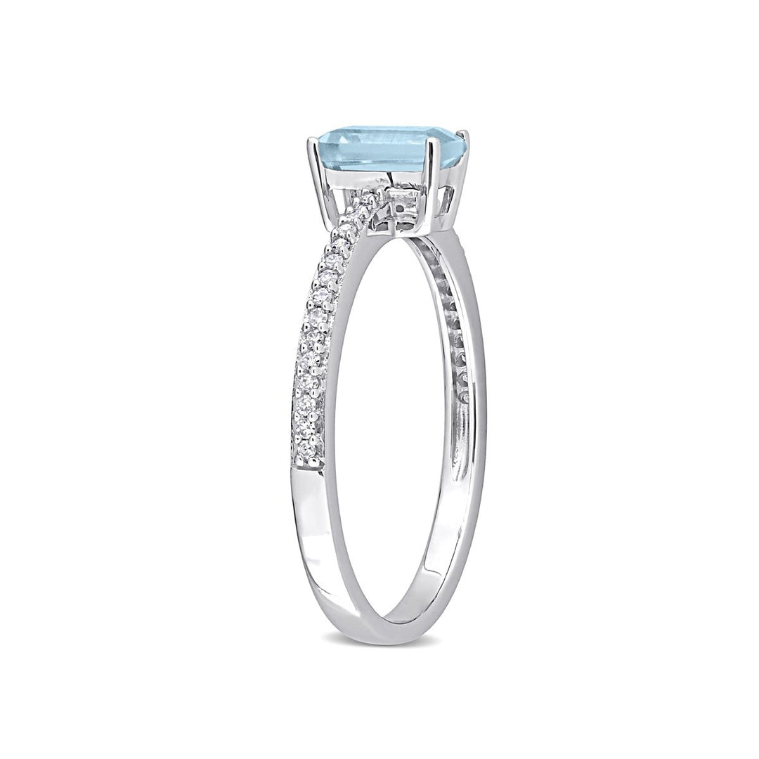 7/10 Carat (ctw) Emerald Cut Blue Topaz and Diamond Solitaire Ring in 10K White Gold Image 4