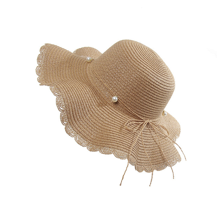 Female Waves Along The Straw Hat With Pearl Bow Image 1