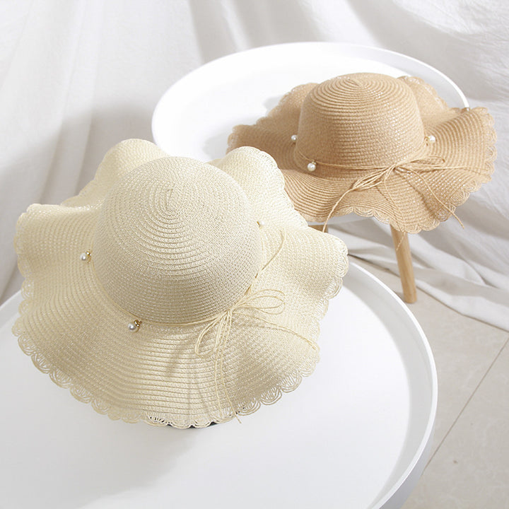 Female Waves Along The Straw Hat With Pearl Bow Image 3