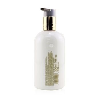 Molton Brown Jasmine and Sun Rose Body Lotion 300ml/10oz Image 2